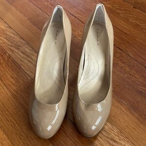 Tahari tan patent leather pump.